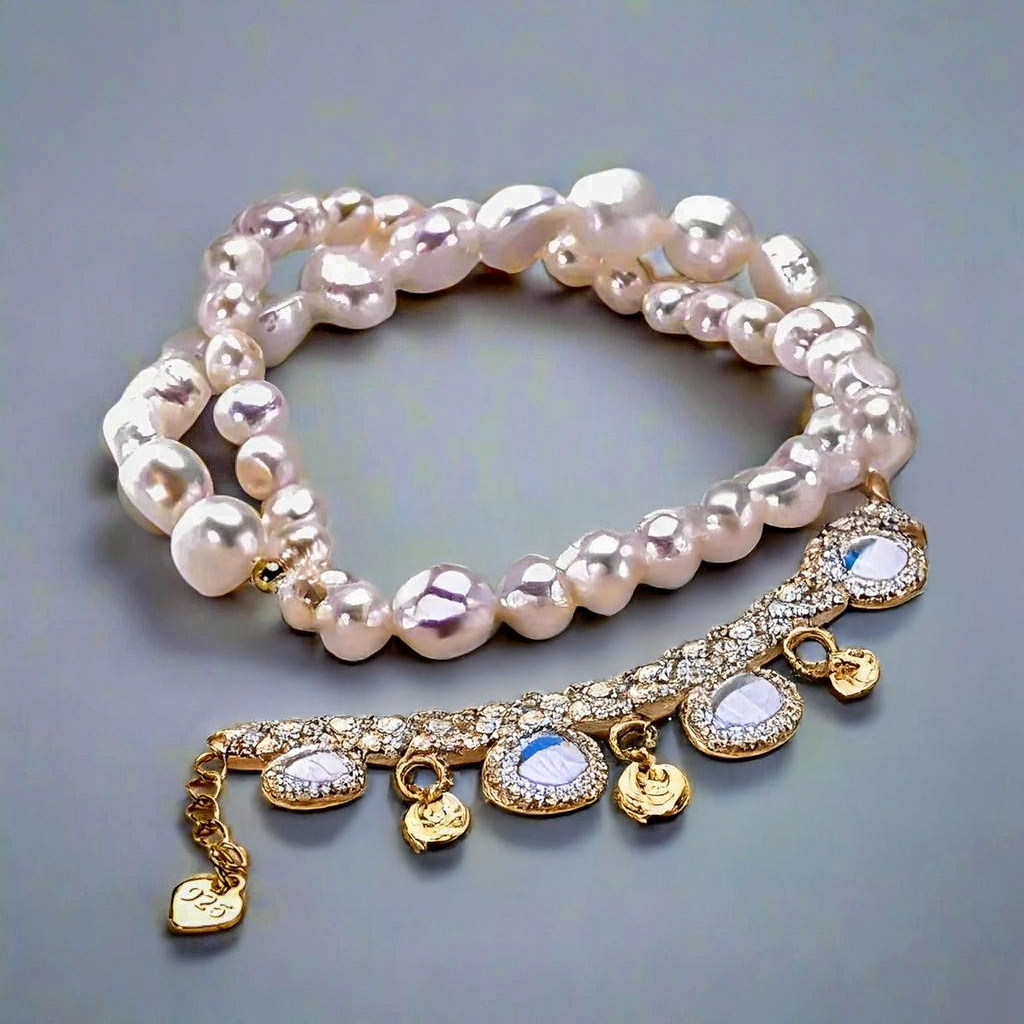 Zoharas Vogue White Rice Pearl Bracelet elegantly displayed, featuring lustrous freshwater pearls uniquely shaped for natural beauty, paired with 925 sterling silver accents for timeless sophistication. A versatile accessory perfect for special occasions or adding classic charm to everyday outfits.